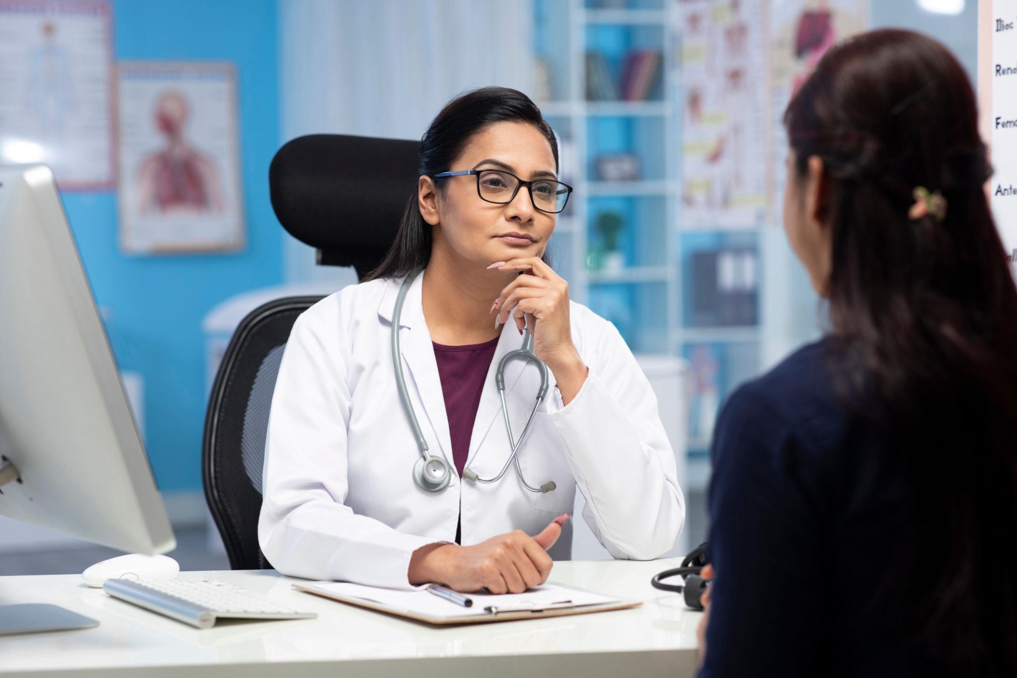 Doctor consulting with a patient in a clinic setting